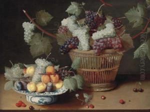 Grapes, Peaches And Plums On A Delft Platter And Grapes In A Woven Basket by Isaak Soreau