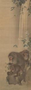 Three Monkeysseated On A Rock Beneath