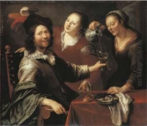 A Gentleman Seated At A Table With Two Serving Girls by Cornelis Stangerus