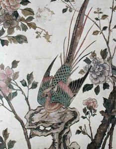 A bird resting on a rock by Anonymous Artist
