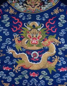 A blue-ground embroidered Kesi dragon robe (detail of dragon) by Anonymous Artist