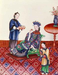 Elegant Chinese lady smelling a flower by Anonymous Artist