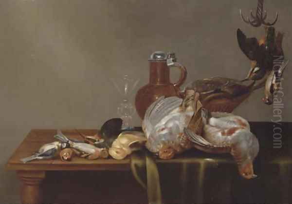 A blue tit, a red finch, a patridge, a kingfisher, and other dead birds on a half draped table, with a glass and silver rimmed jug - view 1