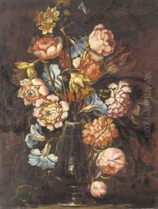 Carnations, tulips, daffodils, roses and other flowers in a glass vase on a ledge by Juan De Arellano