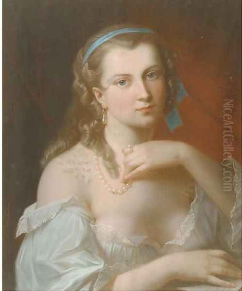 A young beauty wearing a pearl necklace - view 1