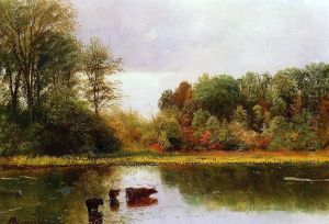 Cows Watering In A Landscape