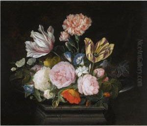 A Still Life Of Parrot Tulips, Roses, Carnations, Morning Glory Andother Flowers In A Silver Dish On A Stone Pedestal by Jasper van der Lanen