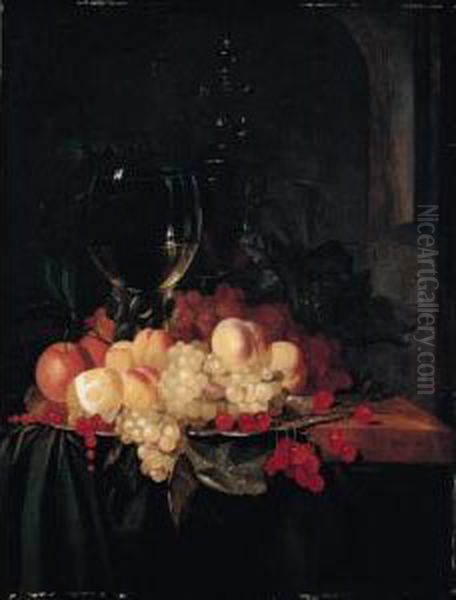 Still Life Of A Roemer And A Wine Glass Together With Cherries, Peaches, Grapes, Redcurrants, Oranges And A Lemon, Arranged On A Silver Plate On A Wooden Ledge Draped With A Green Cloth - view 1