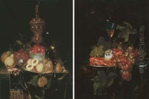 Strawberries In A Blue And White Chinese Porcelain Bowl, With Peaches, Plums And Grapes On A Pewter Platter, A Roemer, A Silver-gilt Cup And Cover, Pears, Prawns And A Knife On A Partly Draped Stone Ledge; And A Lobster And A Partly-peeled Lemon On A Pewt by Nicolaes Van Gelder