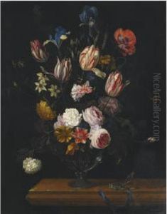 A Still Life Of Tulips, Roses, Irises And Other Flowers In A Glassvase