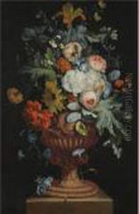 A Still Life Of Roses, Carnations, Daisies, And Irises In A Sculpted Urn Over A Stone Ledge