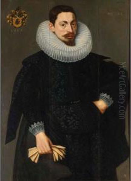 A Portrait Of A Bearded Man, Aged 32, Wearing An Elegant Black Suit With White Lace Cuffs, A Mill Stone Collar And Yellow Gloves, Charged With The Sitter's Coat Of Arms - view 1