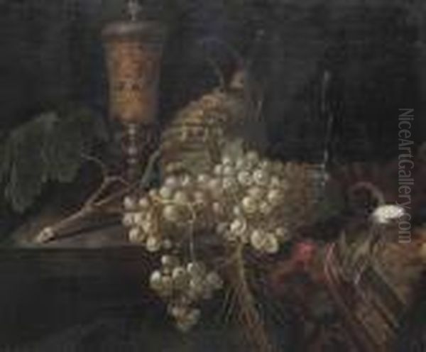 An Elaborately Decorated Vase, A Pocket Watch, Grapes, A Carafe Anda Glass Cup On A Partly Draped Table - view 1