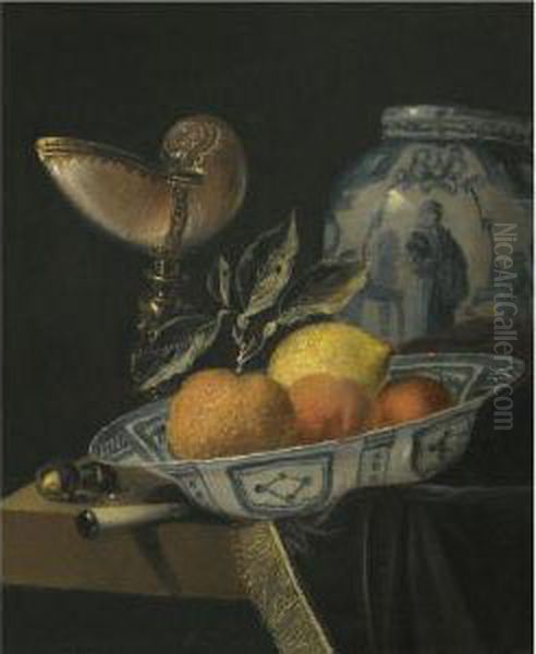 A Still Life Of An Orange, A Lemon And Two Peaches In A Wan-liporcelain Bowl On A Table With A Fringed Carpet And A Nautiluscup - view 1