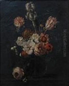 A Bouquet Of Flowers In A Crystal Vase