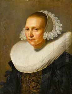 Portrait Of A Lady, Bust-length, In Black Costume With Gold Brocade Detail And A Lace Cap by Johannes Cornelisz. Verspronck