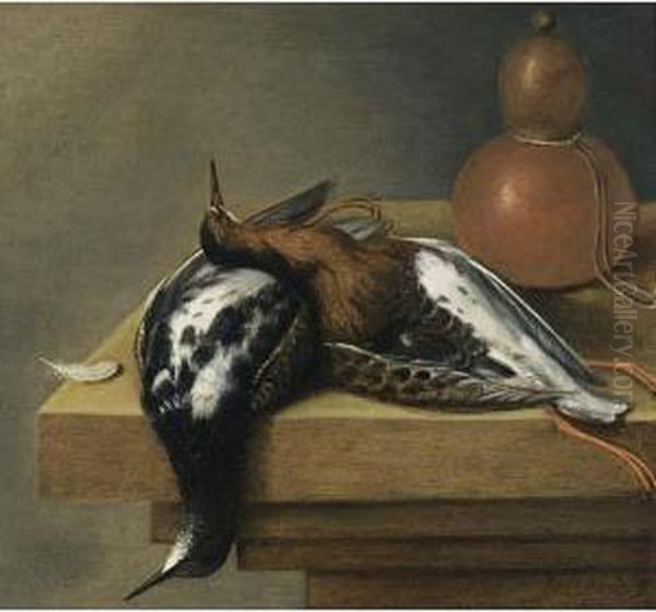 A Still Life Of Two Birds On A Wooden Table - view 1