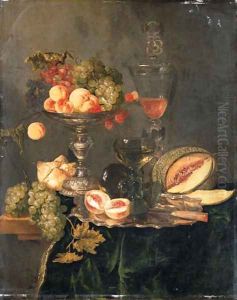 Nectarines, peaches, grapes and raspberries on a silver tazza, two roemers and a sliced peach with a knife on a silver plate, a melon, a bread roll by Abraham Hendrickz Van Beyeren