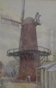 Figure Standing By A Windmill Figure Standing By A Windmill