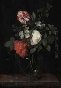 Flowers In A Glass Vase With A Dragonfly On A Ledge