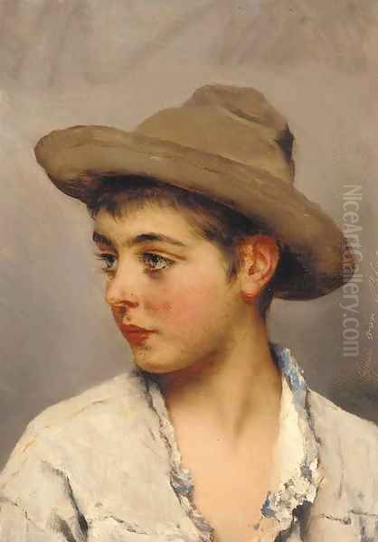 A young boy wearing a stetson - view 1