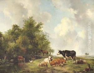 Cattle on the edge of a forest in an extensive sunlit landscape by Hendrikus van den Sande Bakhuyzen