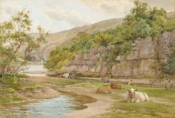 Cattle Resting On The Banks Of A River With A Fisherman Beyond - view 1