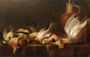 A Partridge And Various Song
Birds With A Facon-de-venise Glass And Stoneware Jug With Tin Cover by Alexander Adriaenssen