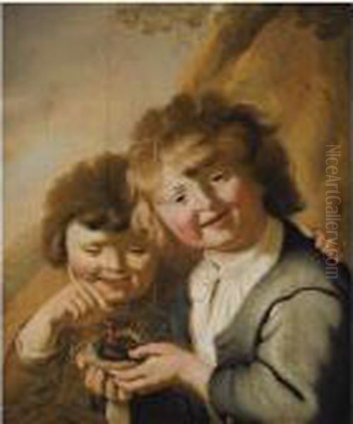 A Portrait Of Two Young Boys Holding A Bird's Nest - view 1