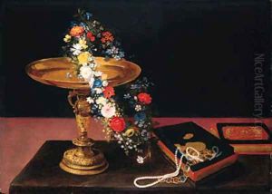 A garland of mixed flowers around a silver gilt tazza and a casket on a table