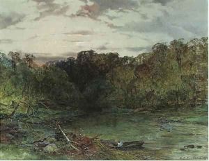 A wooded river landscape at sunset by Charles Branwhite