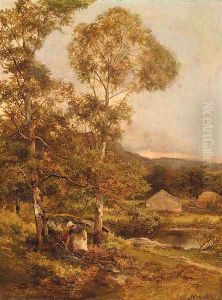 A figure gathering fire-wood by a lake by David Bates
