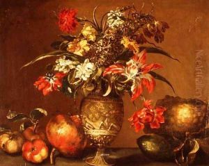 Tulips, a carnation and other flowers in a silver gilt vase with fruit on a ledge by Andrea Belvedere