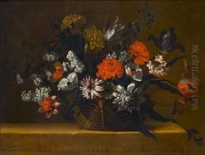 Tulips, Chrysanthemums, Honeysuckle And Other Flowers In A Basket On A Stone Ledge