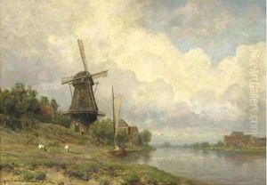 Windmill by a river