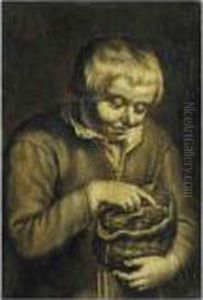 A Young Boy Playing With A Bird's Nest A Young Boy Playing With A Bird's Nest