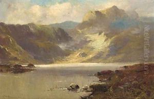A sunlit loch landscape by Gustave de Breanski