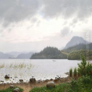A Lake Surrounded By Conifers