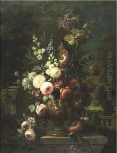 Still Life Of Flowers In An Elaborate Urn On A Marble Ledge
