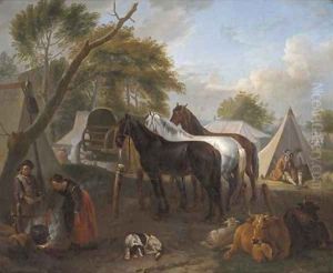 A military encampment with figures cooking in the foreground