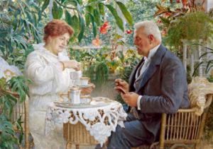 Coppia Di Coniugi Prendendo Un Caffe Nel Giardino D""""inverno Coppia Di Coniugi Prendendo Un Caffe Nel Giardino D""""inverno
