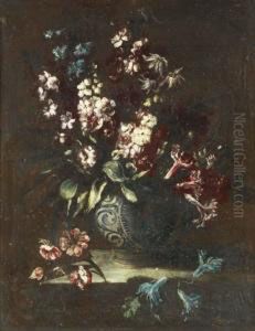 Flowers In A Decorated Vase On A Ledge