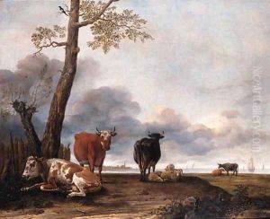 Cattle and sheep by a tree on a river bank, shipping beyond