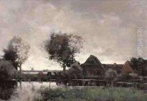 A polder landscape with a farm at dusk