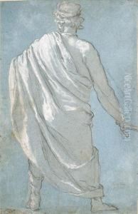 A Man Seen From Behind Wearing A Cloak