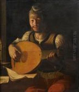 A Young Man Playing A Lute Bycandlelight by Angelo Caroselli