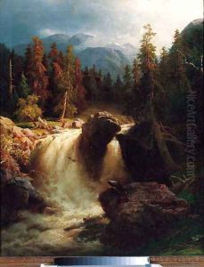 A waterfall in a mountainous wooded landscape