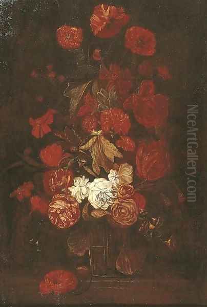 Roses and other flowers in a glass vase on a ledge - view 1