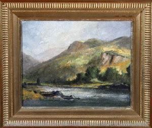 A Misty Hillside Overlooking A Lake