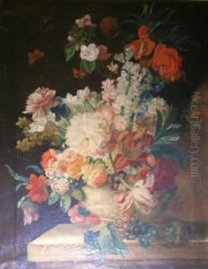 Spring Flowers In An Urn On A Stone Ledge
